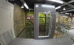 Elevateur en structure vitrée dans un commerce Naturalia Pose d'un élévateur en structure vitrée dans un magasin Naturalia