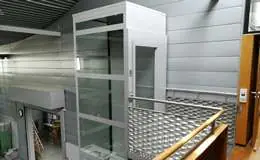 Elevateur pmr stucture vitrée Installation d'un élévateur en structure vitrée dans un laboratoire du CNRS